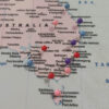 Push pin world map with flags Australia Zoom