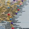 Push pin world map with flags USA Zoom